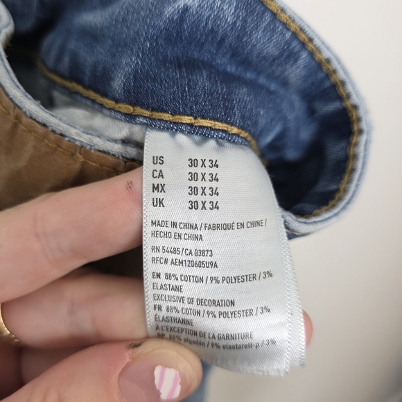 American Eagle Medihm Wash Distressed Low Rise Stretchy Skinny Jeans Size 30×34 - Picture 4 of 6